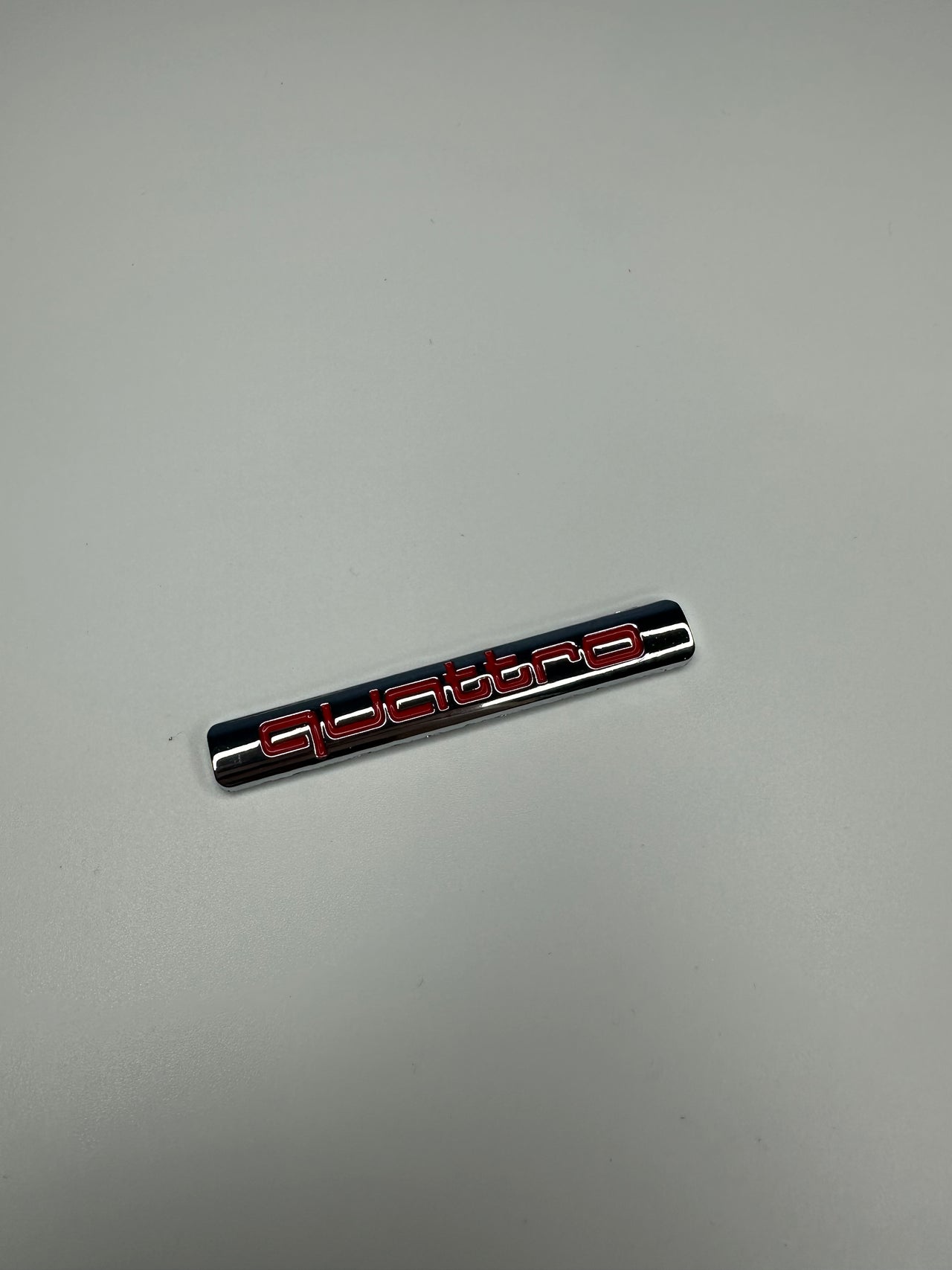 Quattro Silver Chrome with red text