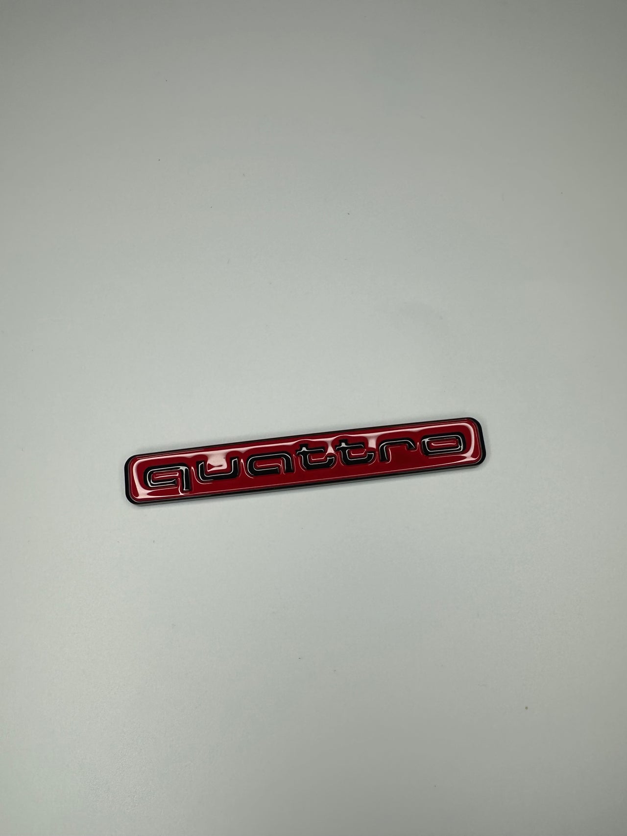 Quattro Gloss Red with black text