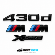 BMW 430d gloss black rear lettering, xDrive emblem and two M wing badges with coloured stripes — Badges.Direct