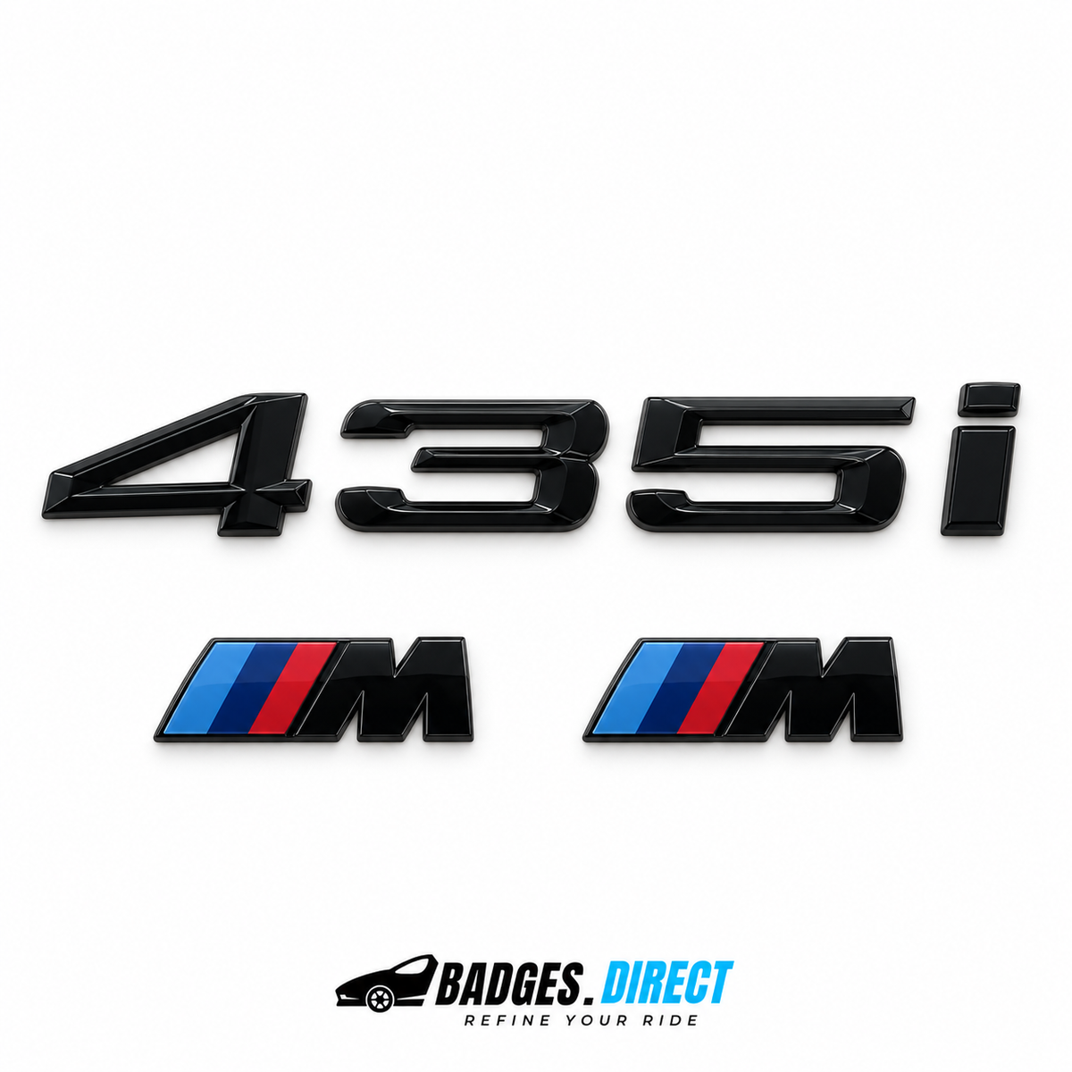 Gloss-black BMW 435i rear lettering and two M wing badges with coloured stripes.
