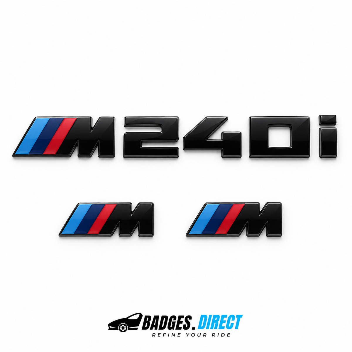 Gloss-black BMW M240i rear lettering and two smaller M wing badges with coloured stripes.