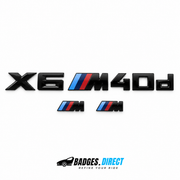 Gloss black X6 M40d rear lettering and two tricolour M wing badges