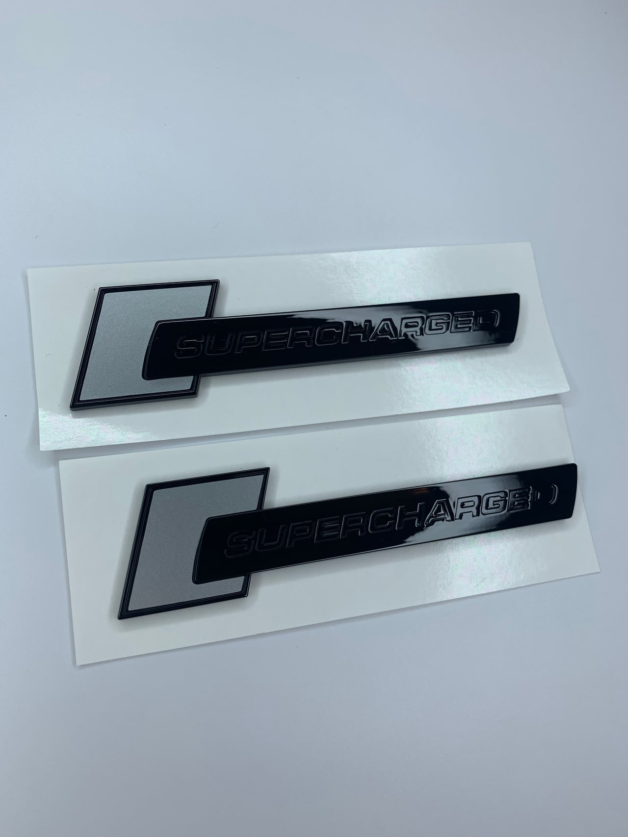 X2 Supercharged Side Badges